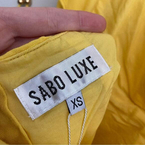 Sabo Skirt Luxe Espardell Tie Neck Ruffle Faux Wrap Dress - Picture 2 of 9